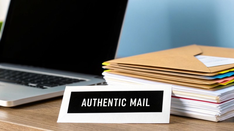 A padlock and key icon floating over an email envelope, symbolizing authentication and trust.